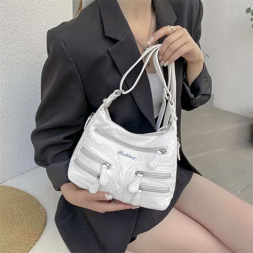 Sac à bandoulière multi-poches - Interior Design Article avis et prix
